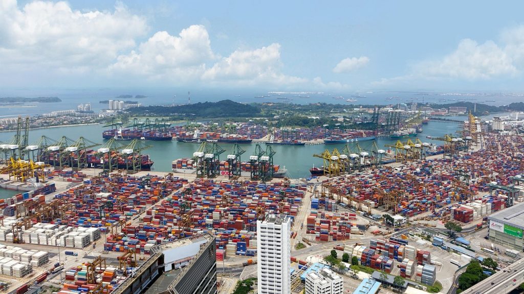 Chart showing rising port and handling fees on China-linked exports and the cost impact per TEU for forwarders